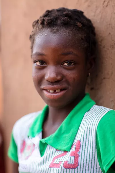 Salmu, 11, at her home