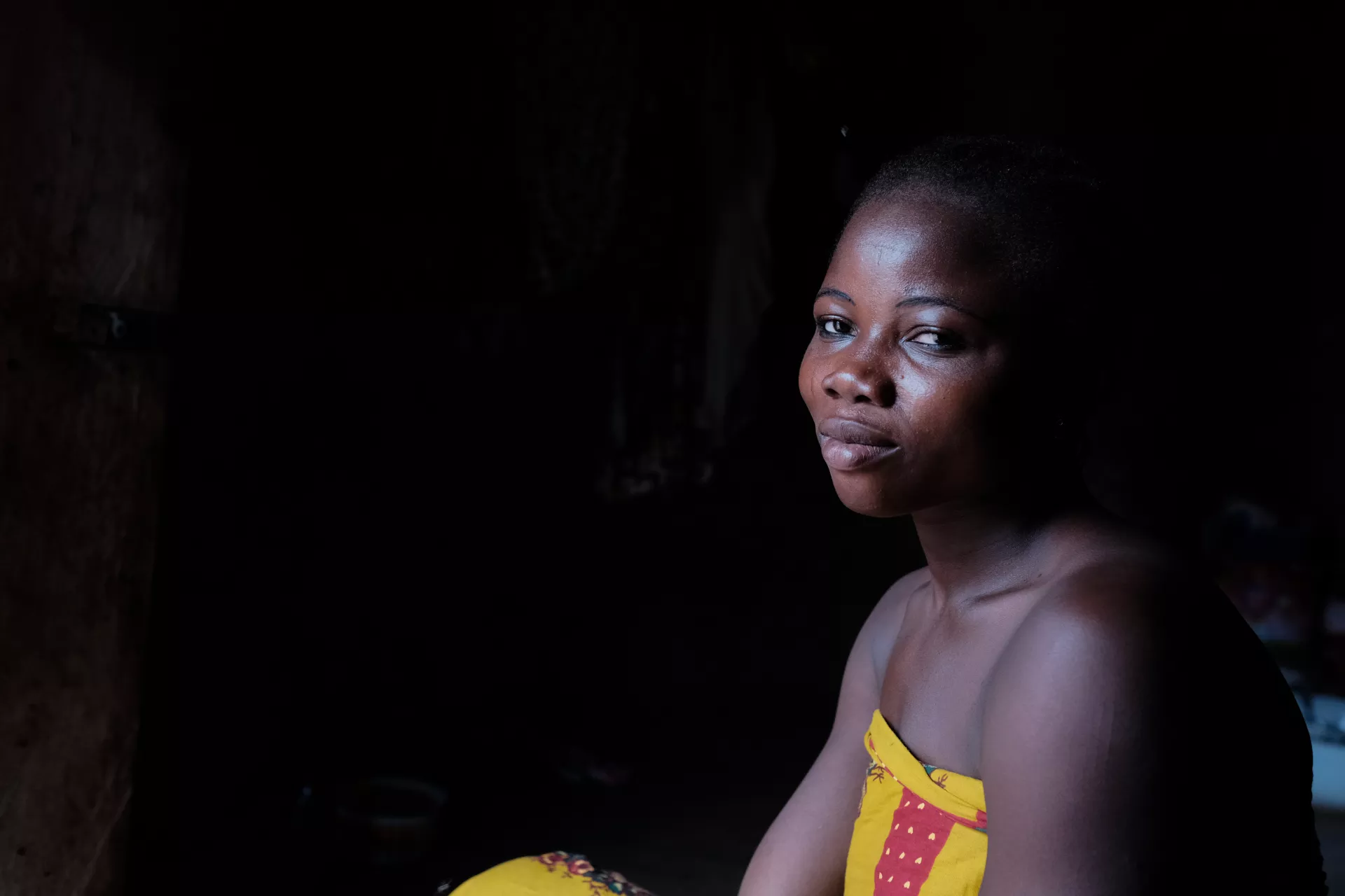 Adamu Alhassan in the doorway of her bedroom in Gbandu in the Northern Region