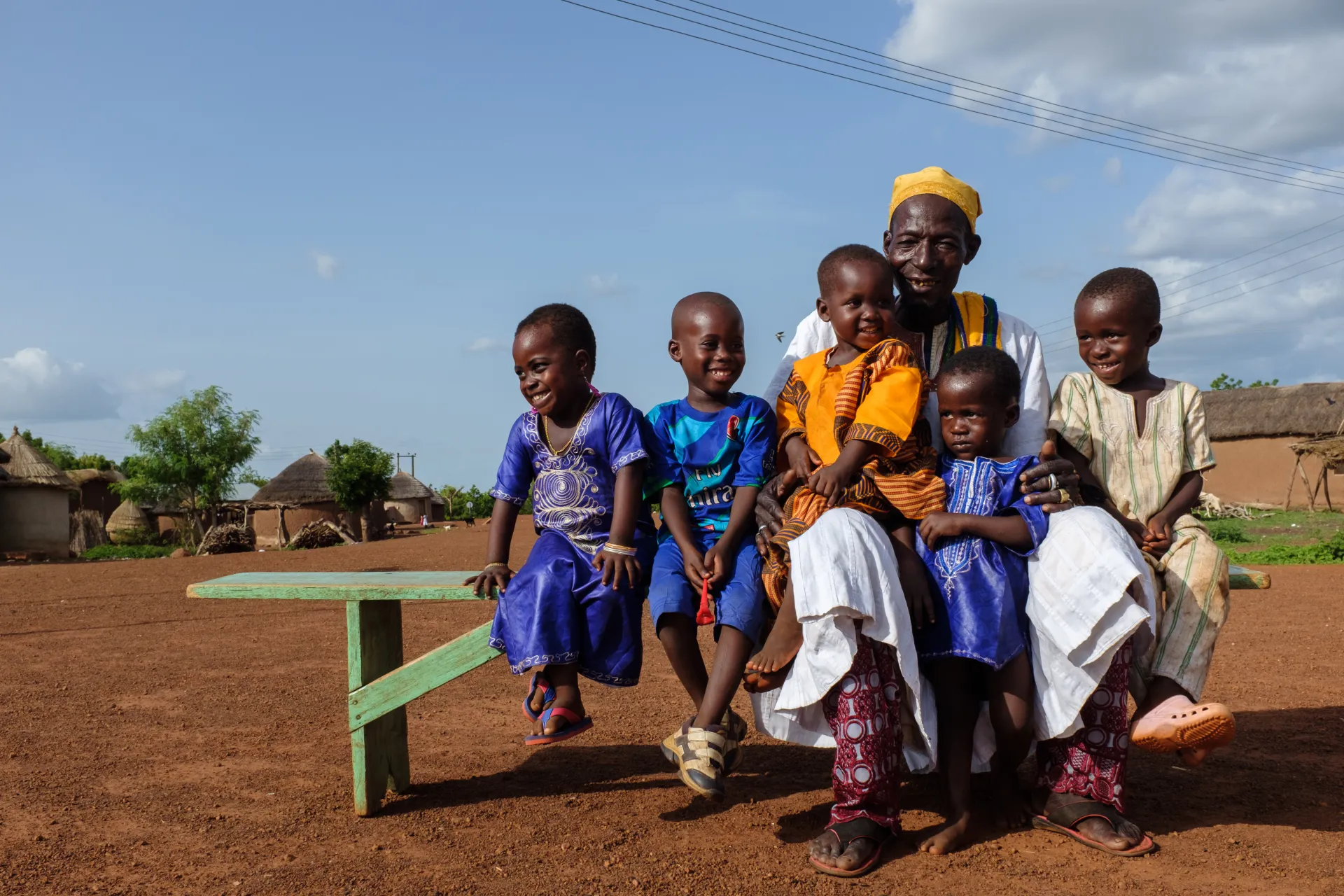 A grandfather with his grandchildren in the northern part of Ghana