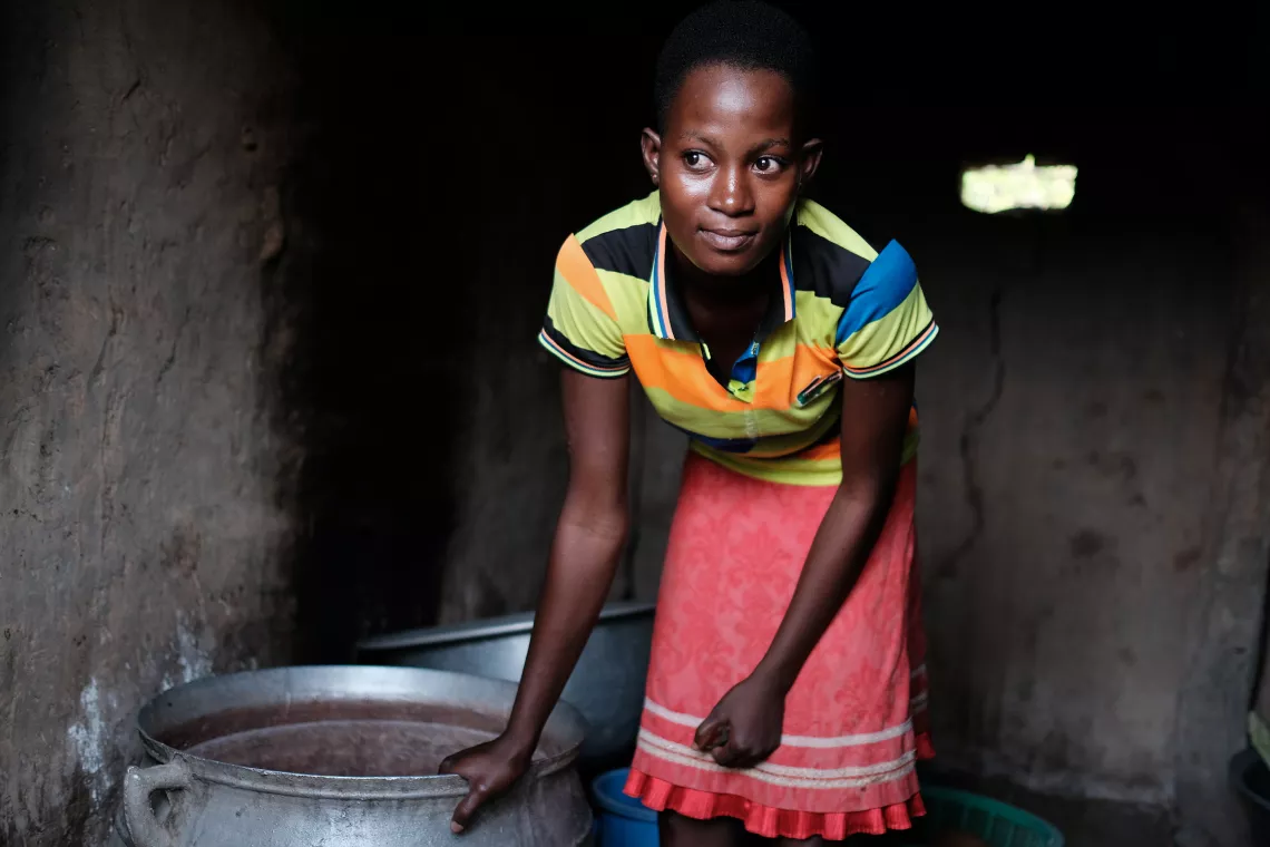 A young girl photographed in her home in the Northern Region