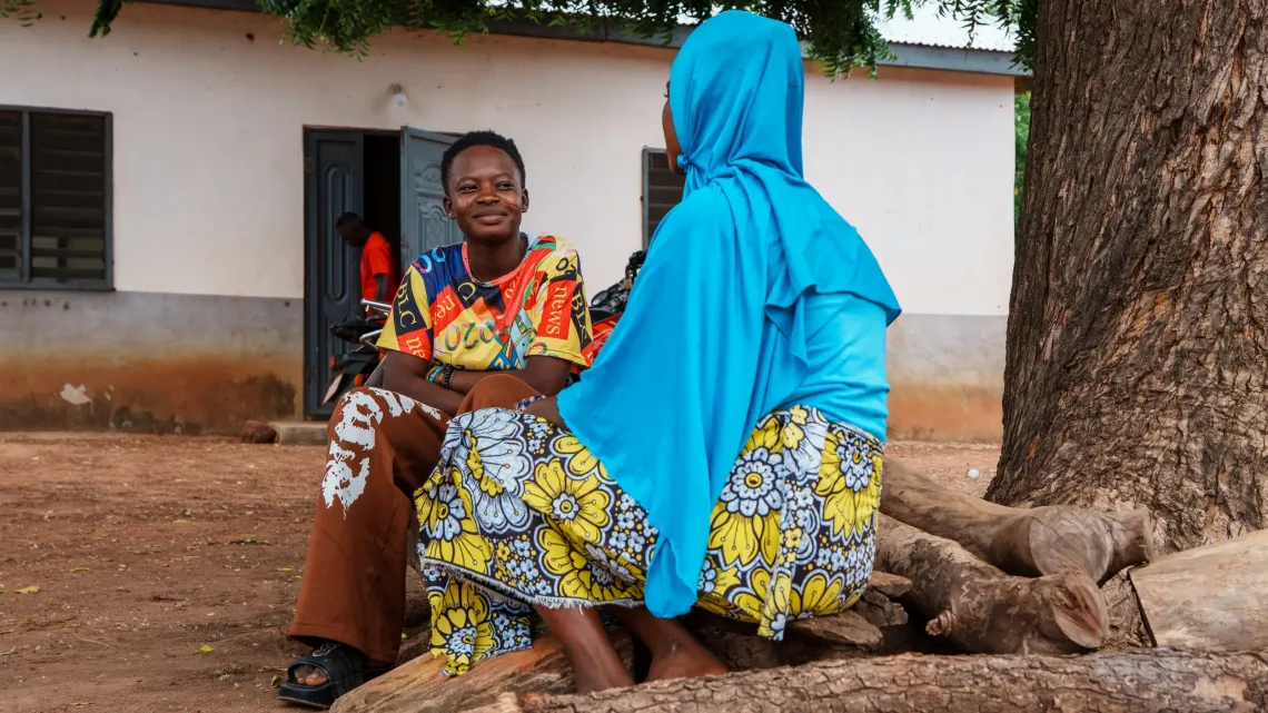 Two girls interact, showing why early support, protection & opportunity matter for girls. 