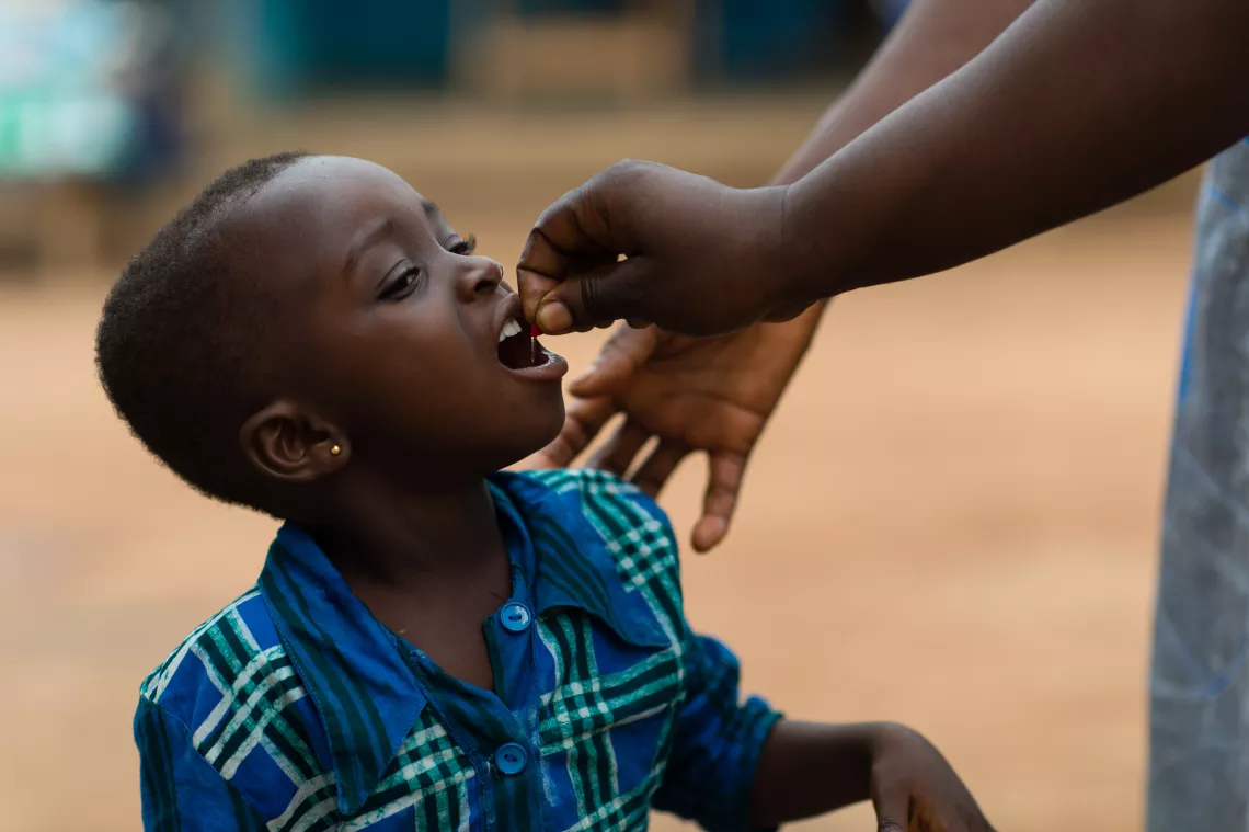 A child receiving a dose of vitamin A in Achiase in the Birim South District of the Eastern Region of Ghana on 6 June 2013