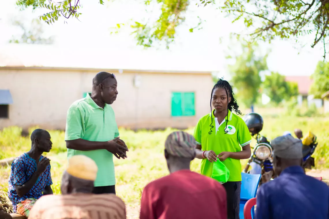 Agrivest Africa team engages men and women in the community.