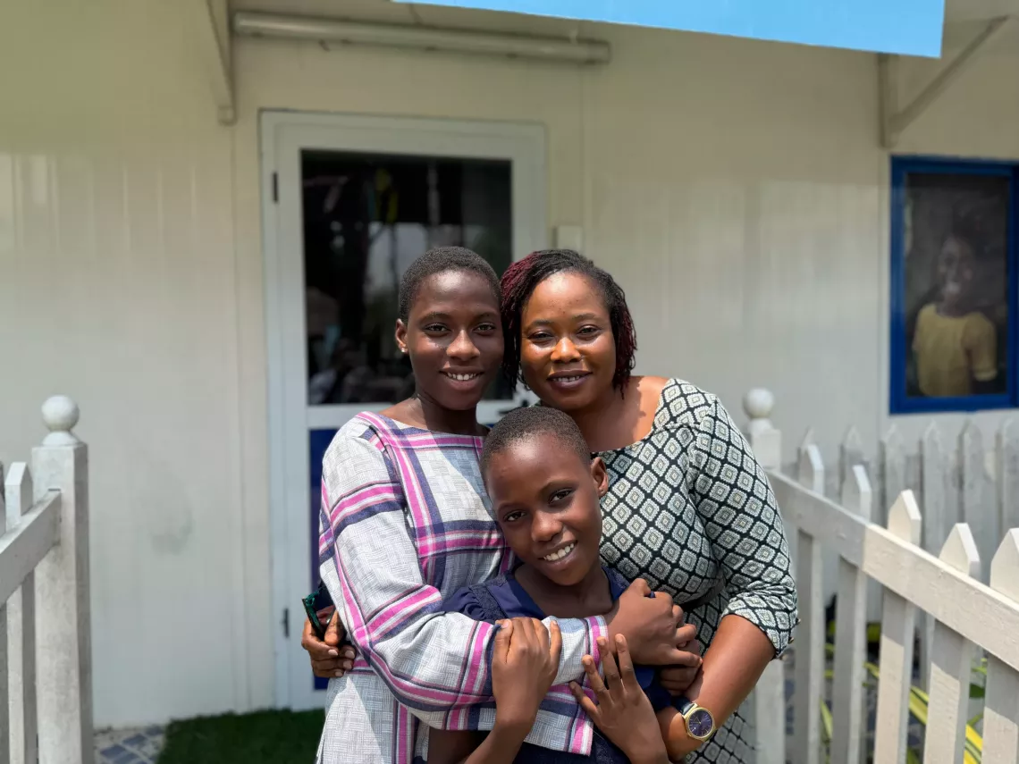 A family portrait of Miriam and her 2 daughter's Ewura Esi and Ewura Adjoa 