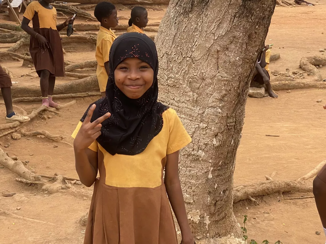 Zenab Alkasum, a 9-year-old student, now exhibits increased confidence in her class.