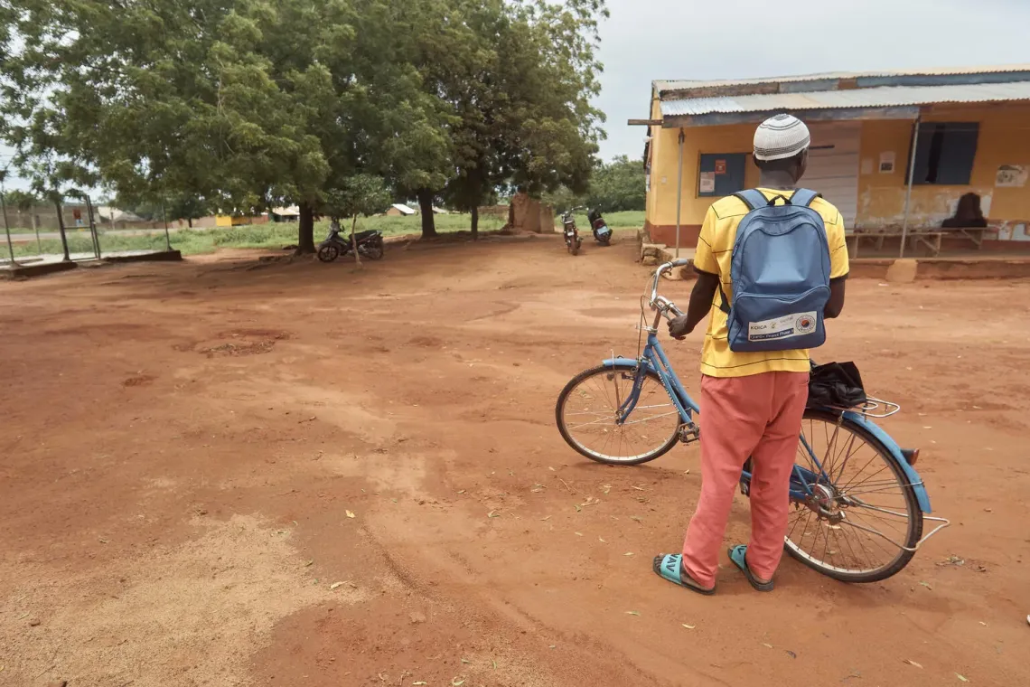 In Nagboo, North East Ghana, a Community Health Promoter sets off by bicycle to deliver maternal and child health services - reflecting the dedication of frontline workers under the UNICEF and KOICA CHPS+ Project.