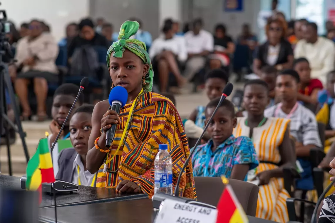 A young student speaking 