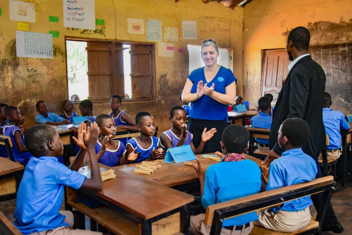 Chief of &nbsp;Education for UNICEF Ghana, Christin Lucille McConnell, with a teacher in Diani Presby Primary school, teaching students using Differentiated Learning (DL)