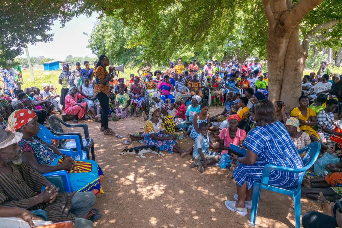 Helen talks to the girls  and community leaders during the community engagement event in Zokor. 