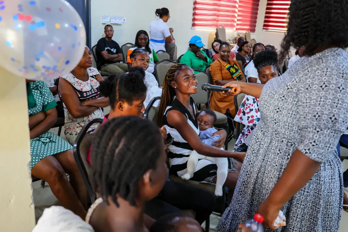 Josephine, speak to a midwife during an engagement at the NAM school 