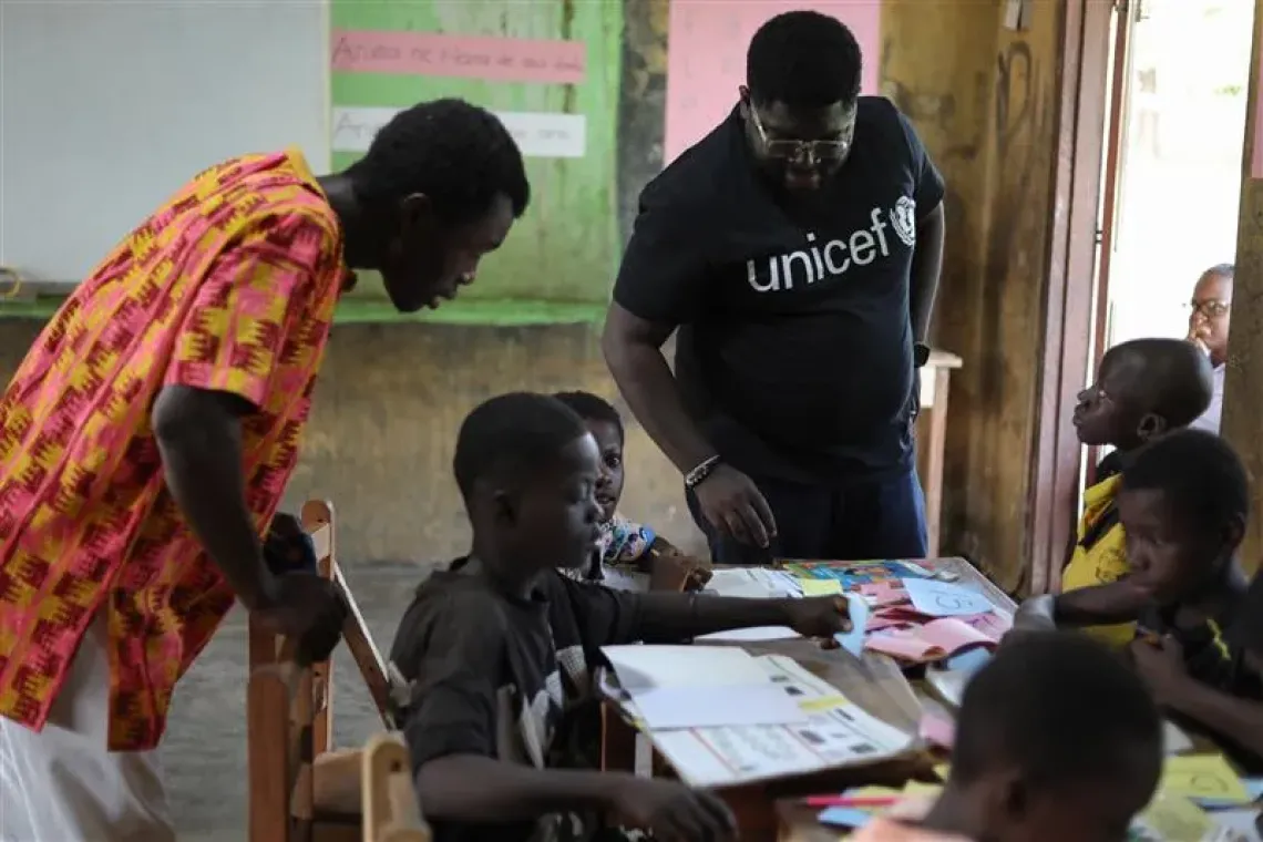 Christopher Nkrumah, education officer, UNICEF Ghana, observes a Complementary Basic Education(CBE) program class in the Bono East region, Ghana.
