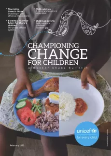 A picture of a child showing varieties of healthy nutritional foods.