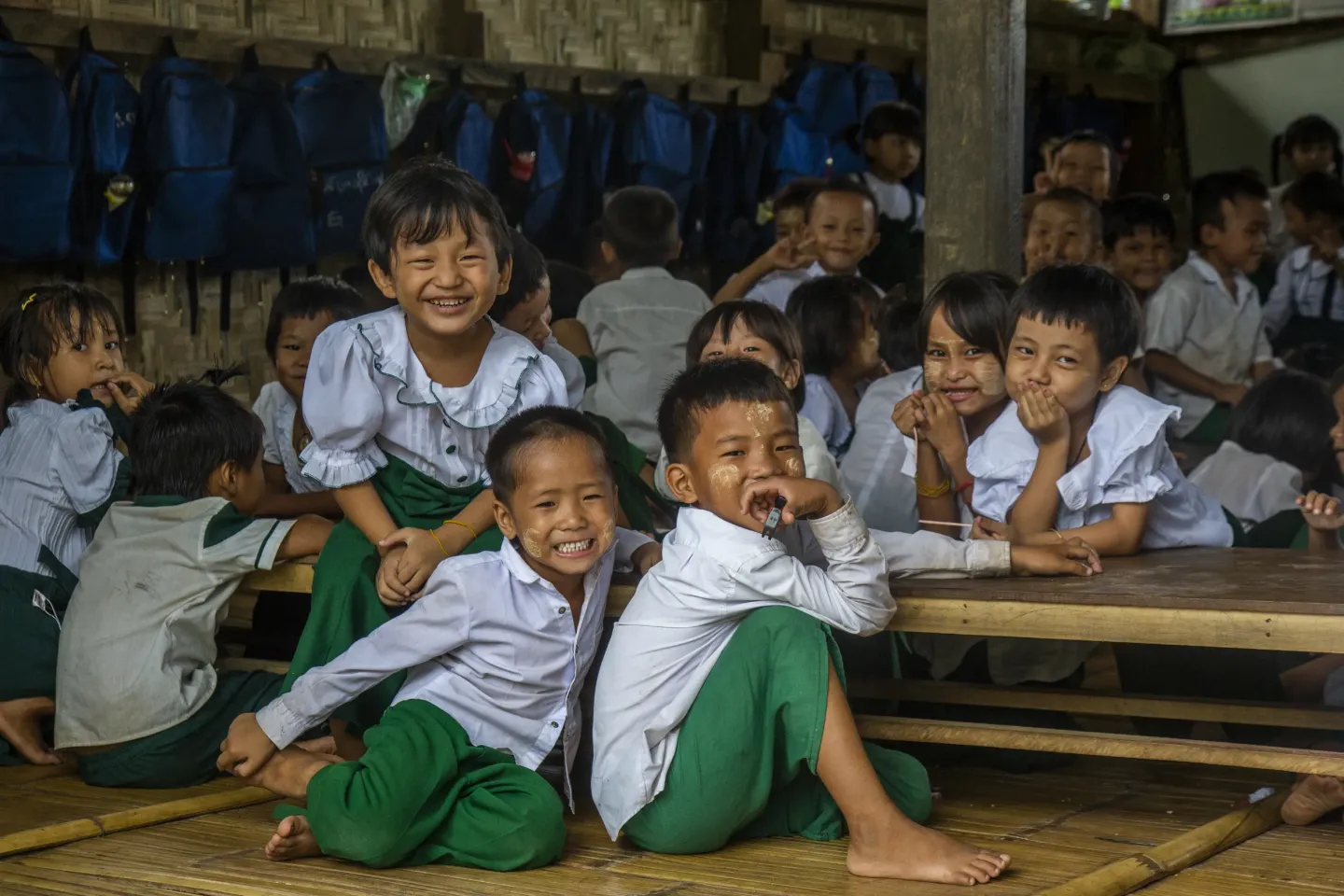 Primary students play inside the classroom &mdash; small moments reflecting resilience amid challenging circumstances