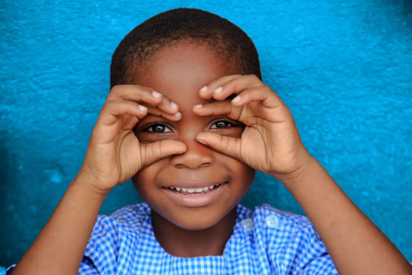 Happy child smiling in Gonzagueville, in Abidjan, C&ocirc;te d'Ivoire.