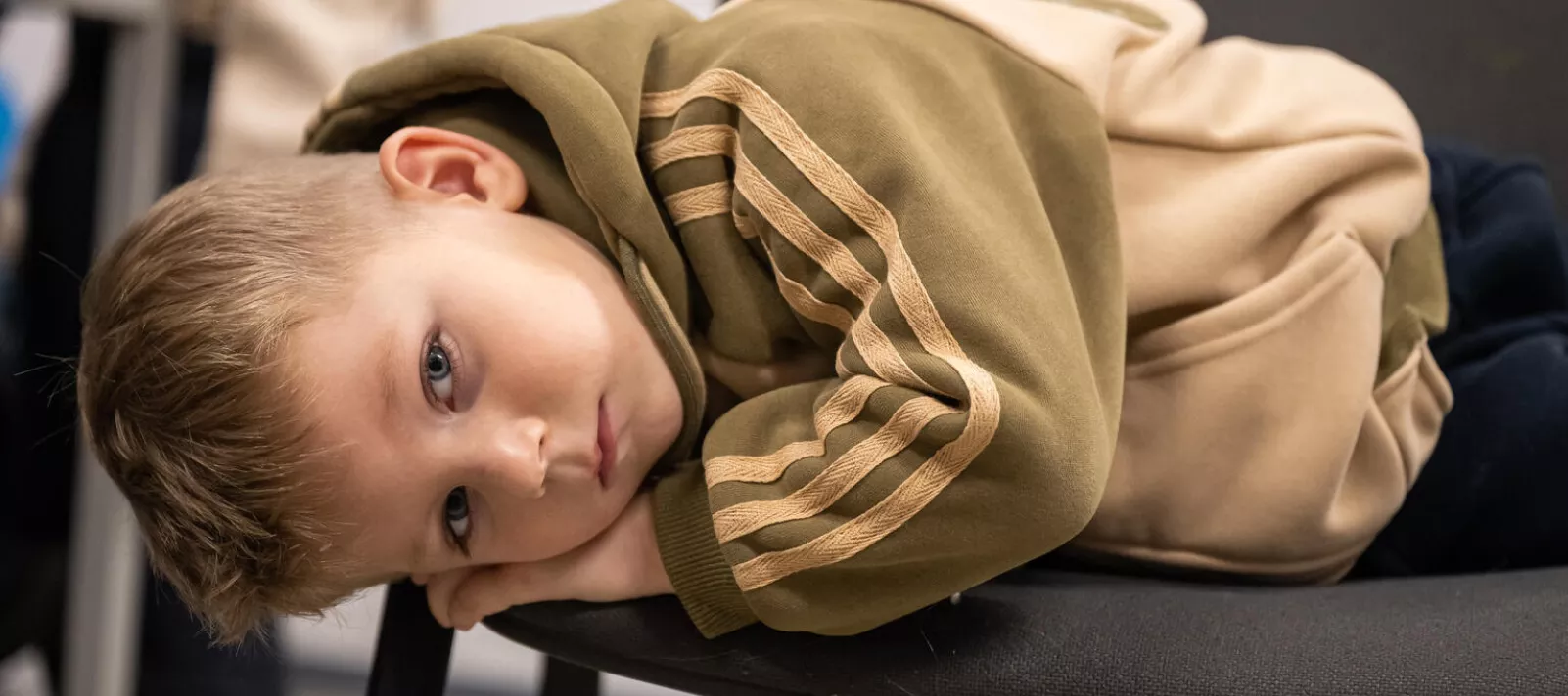 When planes flew low near the modular town in 2022, Mykyta (4) ran out, grabbed his older sisters, pushed them inside, closed the door and sat on tiptoe.
