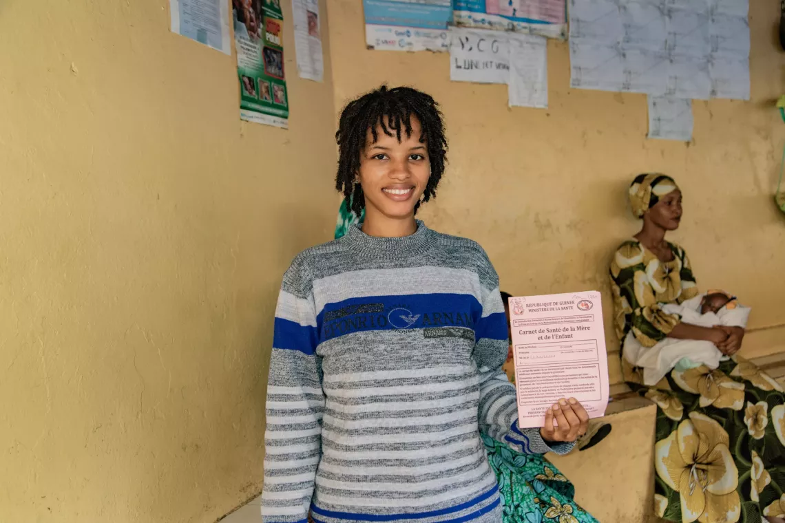 Habigoulo, 20, old high school student, pregnant with her first child, having just been vaccinated, Conakry, Guinea. Bernay-Fotoba health centre in the Matoto commune of Conakry, Guinea.