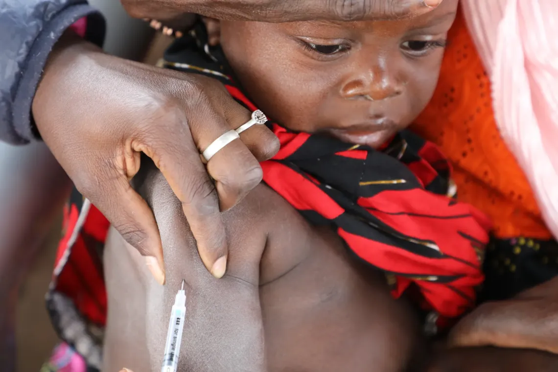 child being vaccinated
