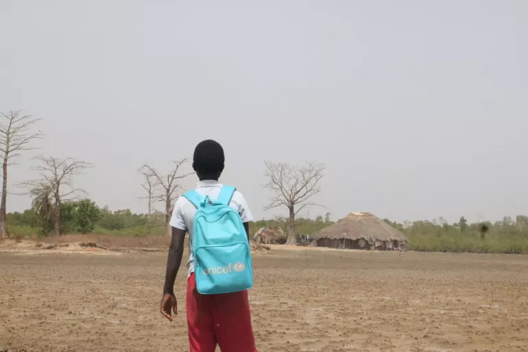 boy with UNICEF bag