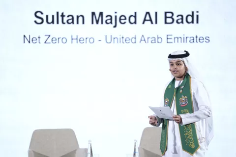 Sultan speaking on stage 