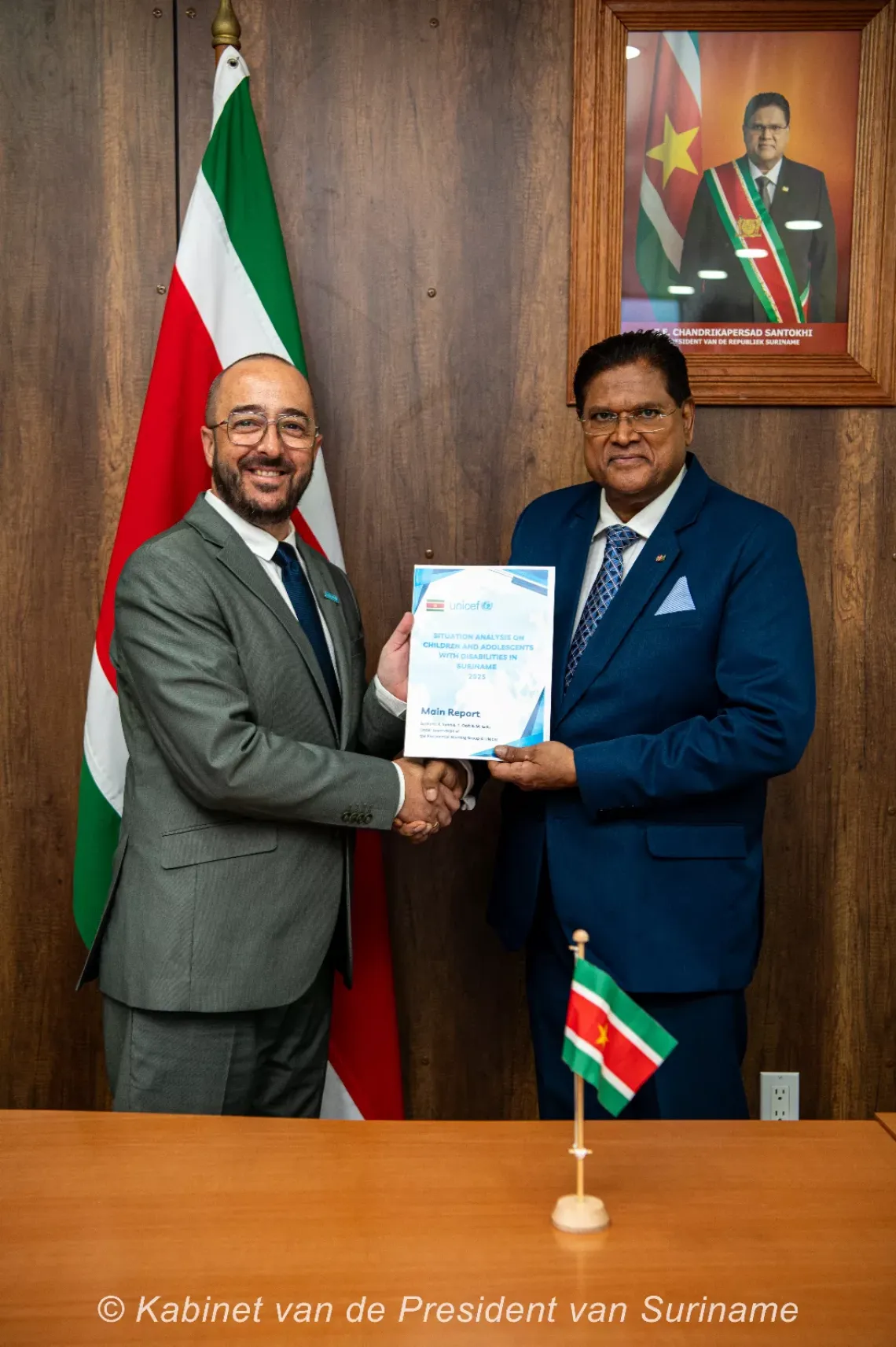 UNICEF Program Manager Suriname and President of Suriname during official hand-over ceremony of the national disability policy