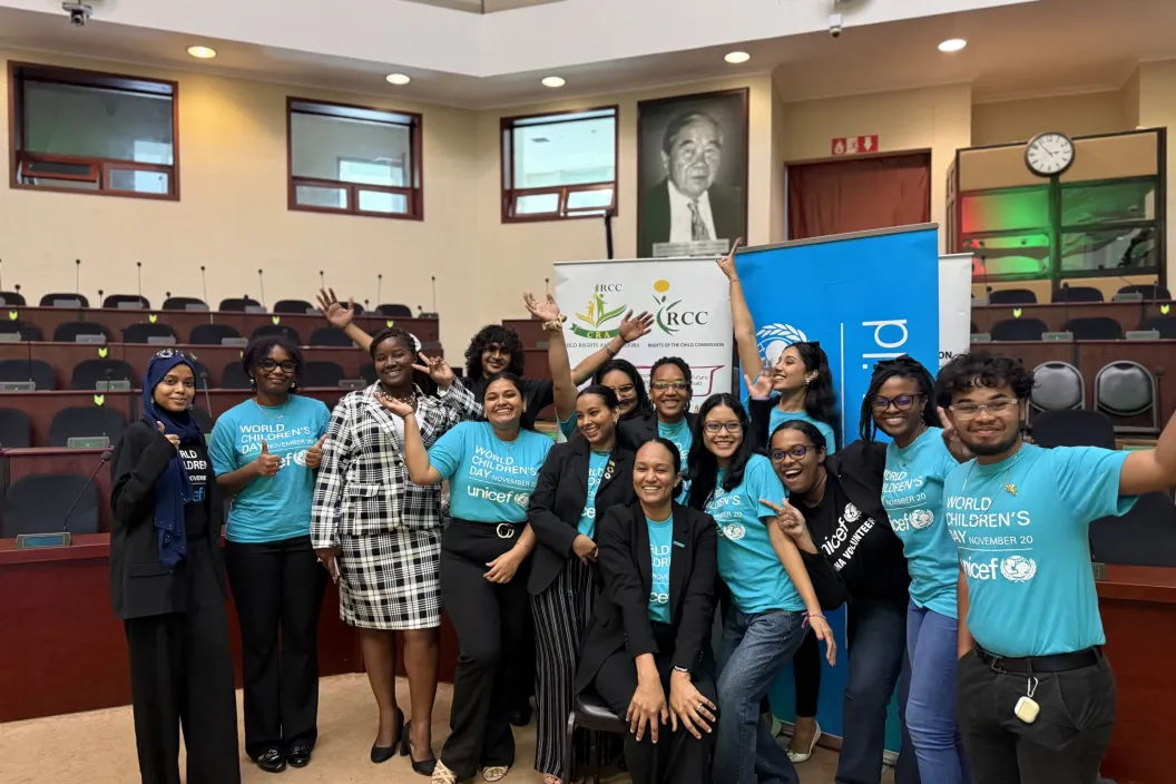 UNICEF Guyana Communications Officer Crystal Stoll with UNICEF Volunteers at the "My Day, My Rights" World Children's Day event in Guyana
