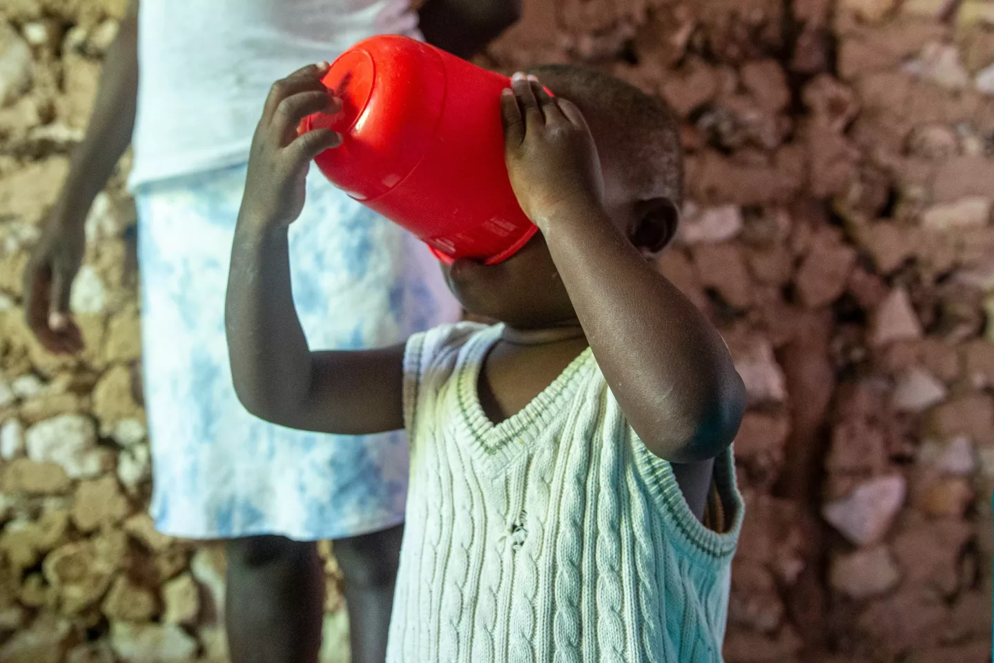 A child drinking water.