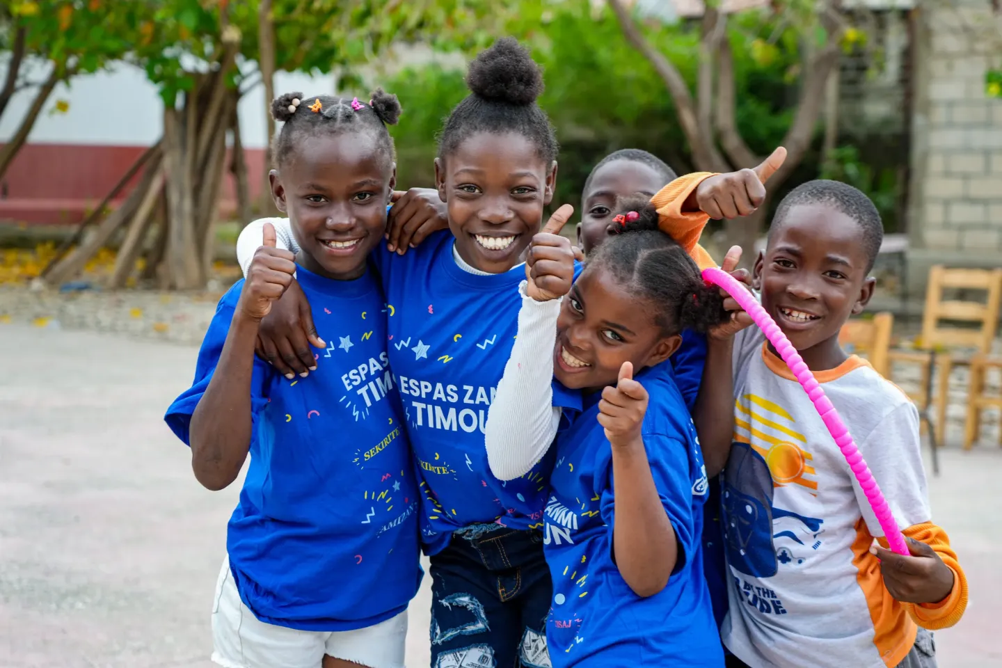 A group of children smiling