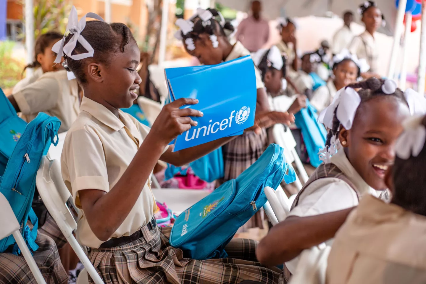 Students receiving their school supplies