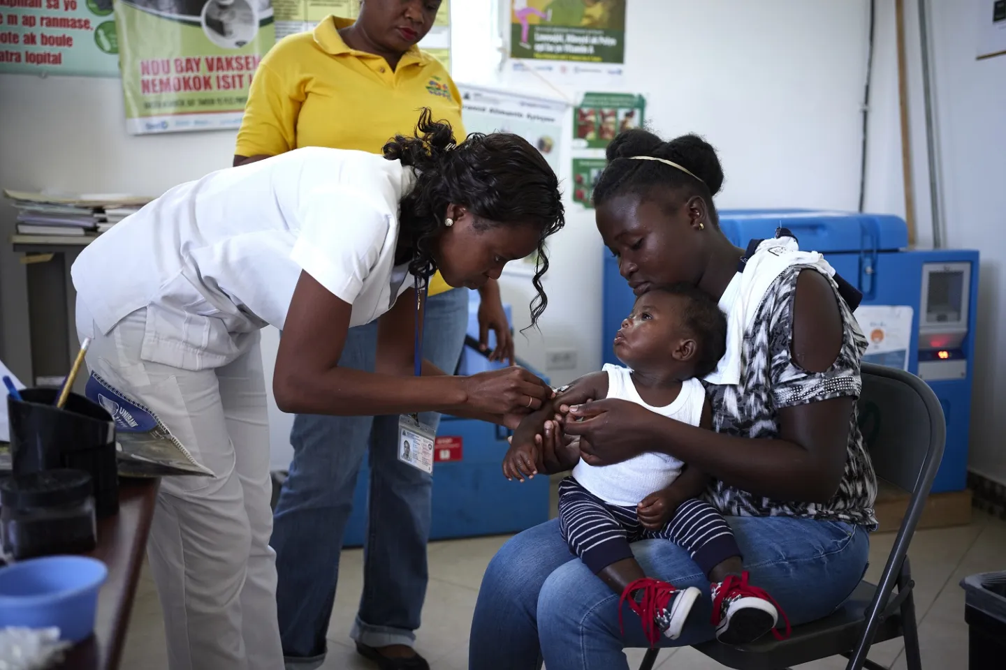 A young child is being vaccinated 
