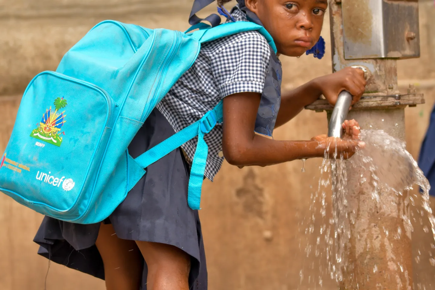 A child drinking water.