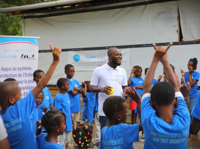 A psychosocial activity session taking place at a displacement site.
