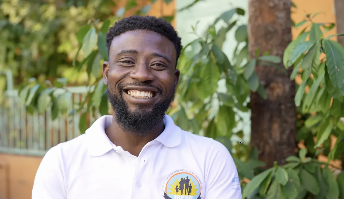 A young man smiling