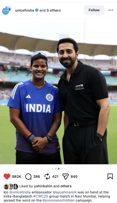 UNICEF India National Ambassador Ayushmann Khurrana poses with an Indian women's cricket team player on the field at a stadium during the ICC Women's Cricket World Cup 2025 India-Bangladesh match in Navi Mumbai.