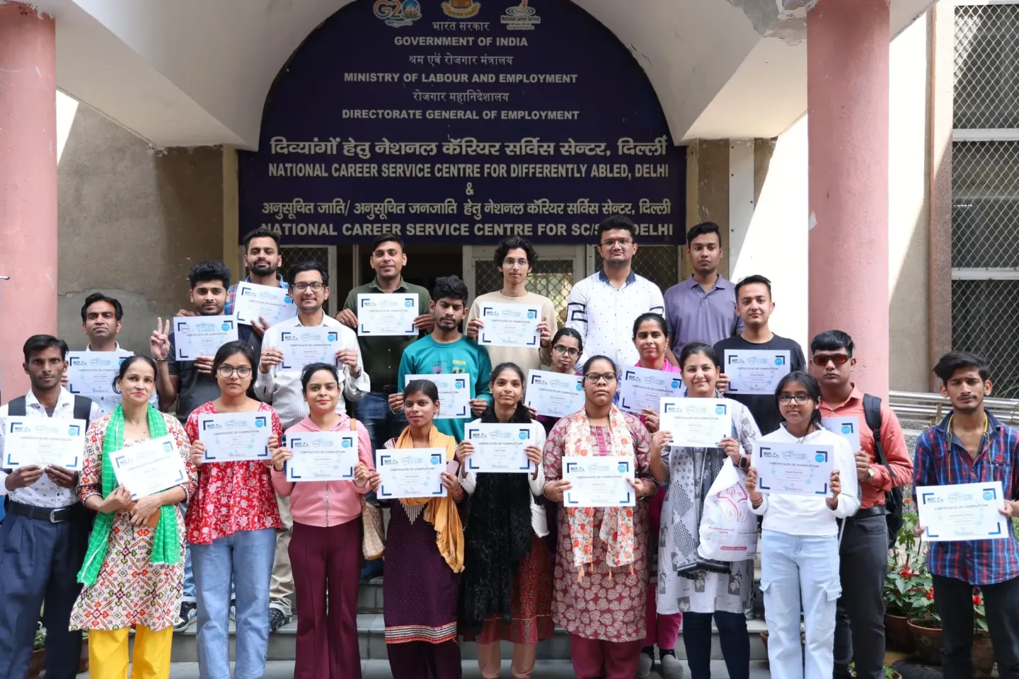 P2E learners pose with their certificates