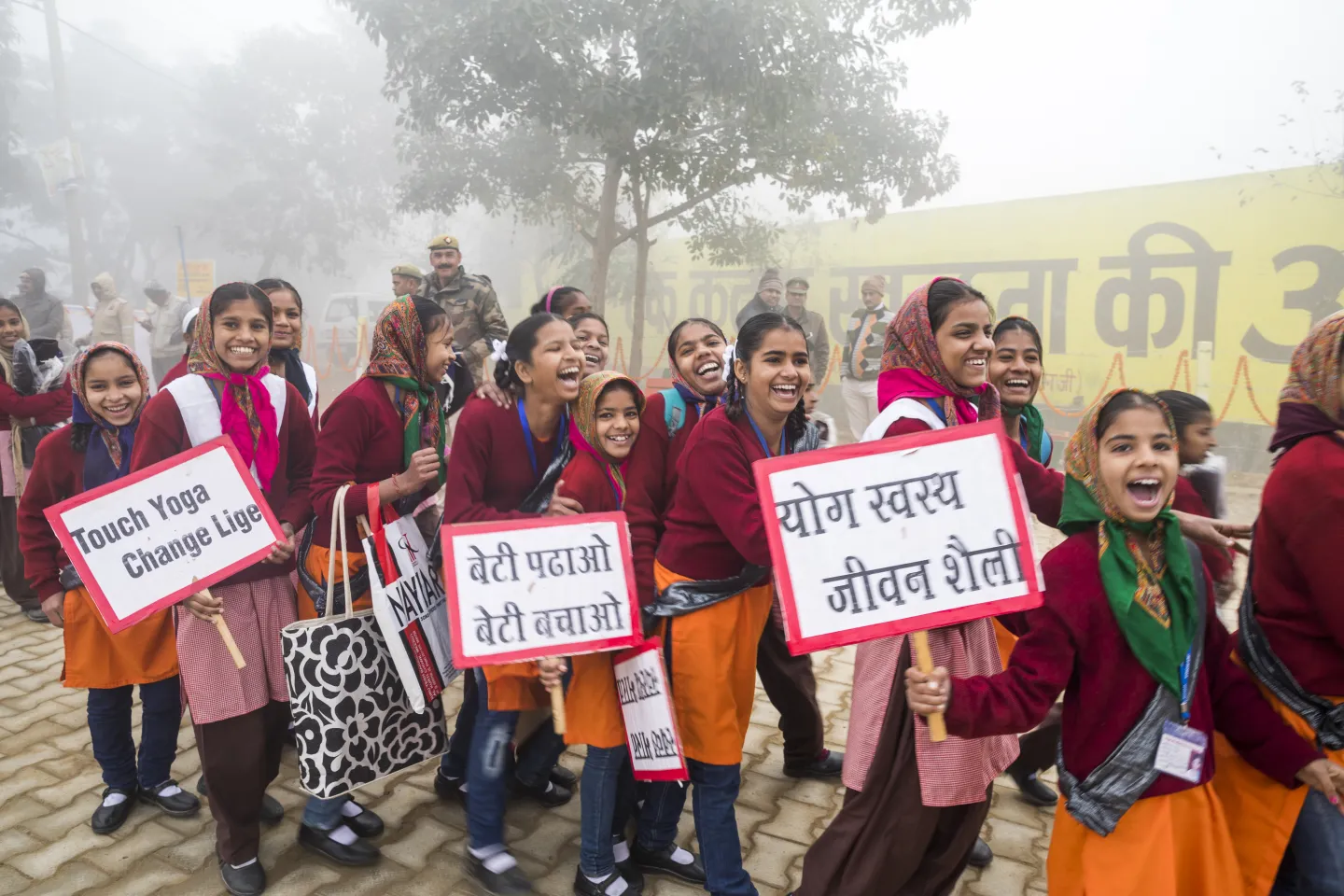 Children from the Meena Manch arrive with placards for a play prior to the arrival of Norwegian Prime Minister Ms Erna Solberg in a Government Primary and Middle School at Nithora, Uttar Pradesh.