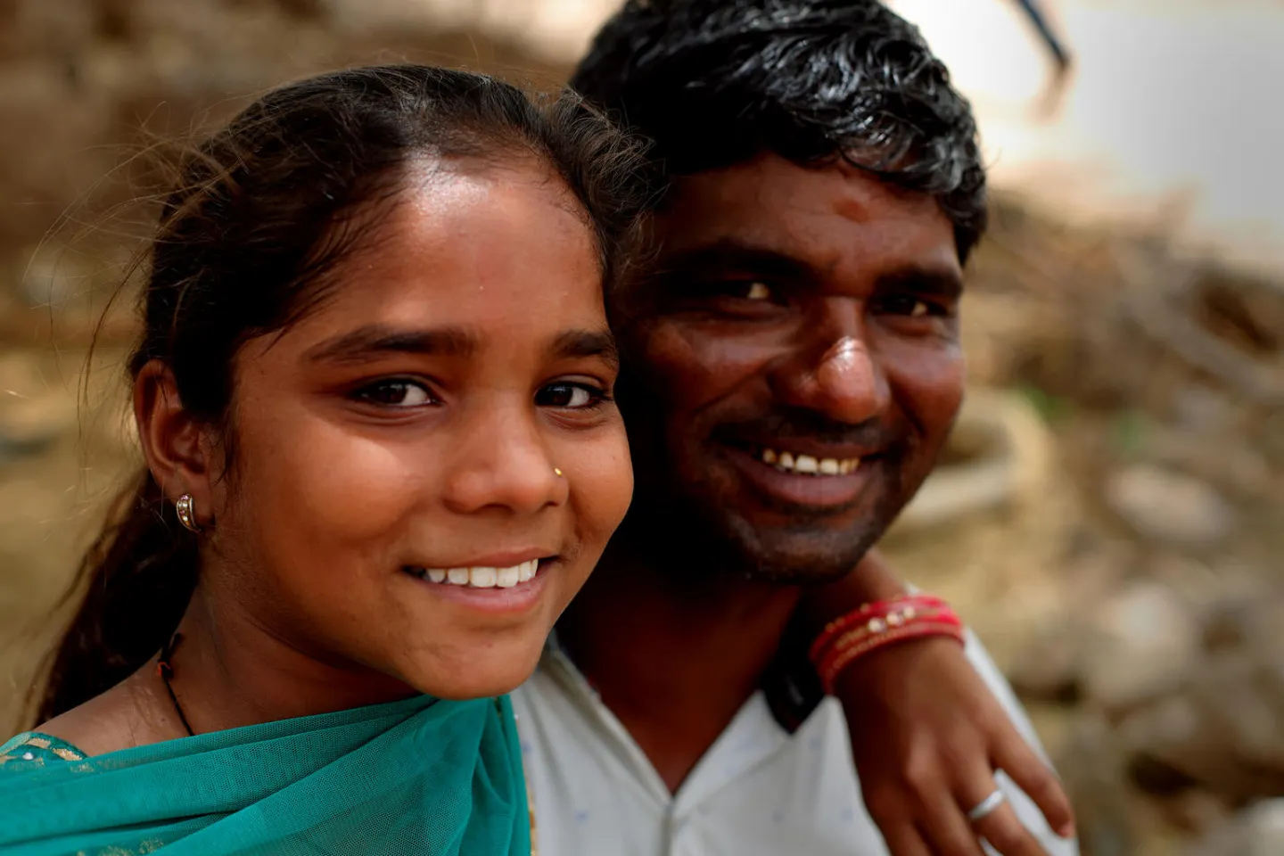 Fourteen-year-old Payal Ben with her father Budiya Ujmubhai in Banaskantha district in western Indian state of Gujarat.