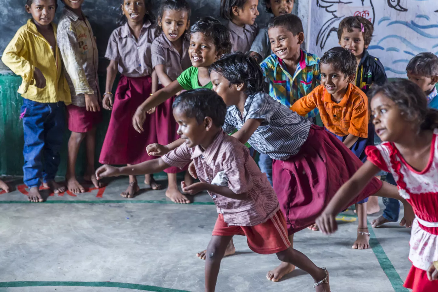 Children react during an activity at an Anganwadi center in Cherki, Bihar. 