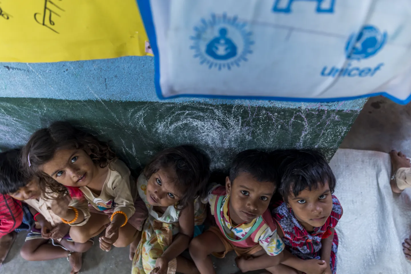 Children react during an activity at an Anaganwadi center in Cherki, Bihar. 