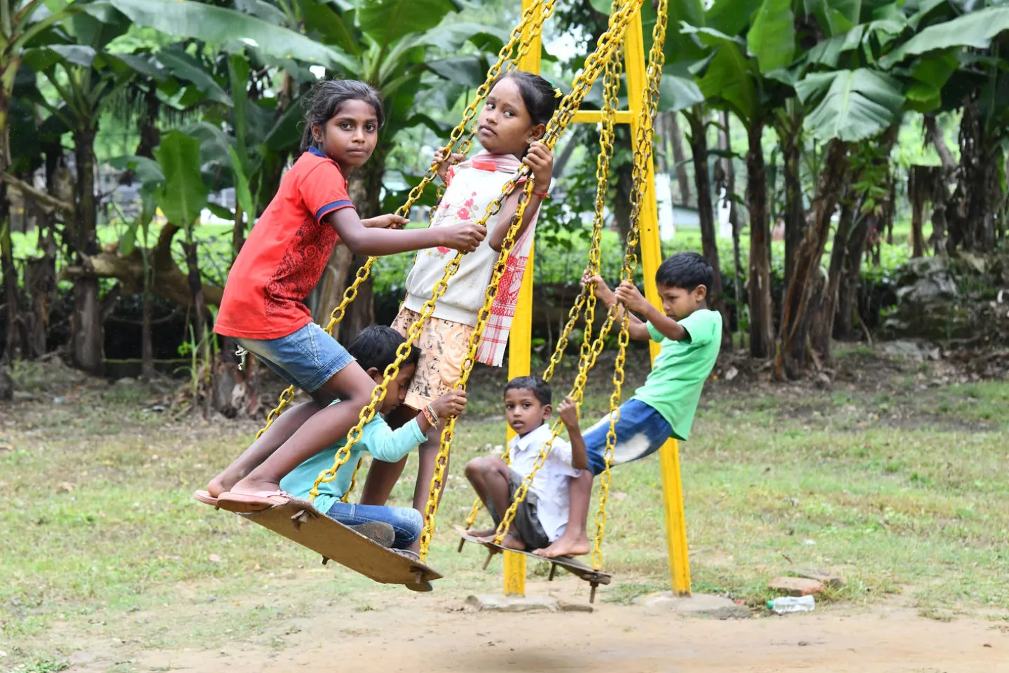 Children playing in a school play ground at Romia Tea Estate in Dibrughar district, Assam on August 20, 2019.