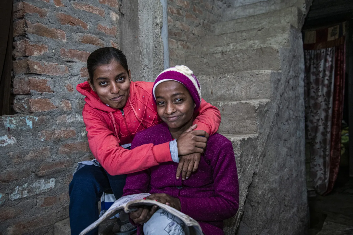 Bharti Kumari, a community mobilizer breaks the silence around menstrual hygiene with her sister Nidhi Kumari in their village in Bihar