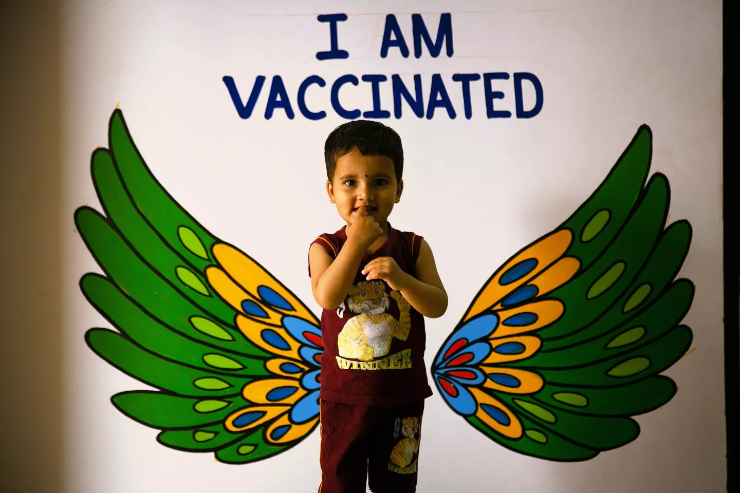 A vaccinated child poses at a Health Care Centre in Jabalpur, Madhya Pradesh.