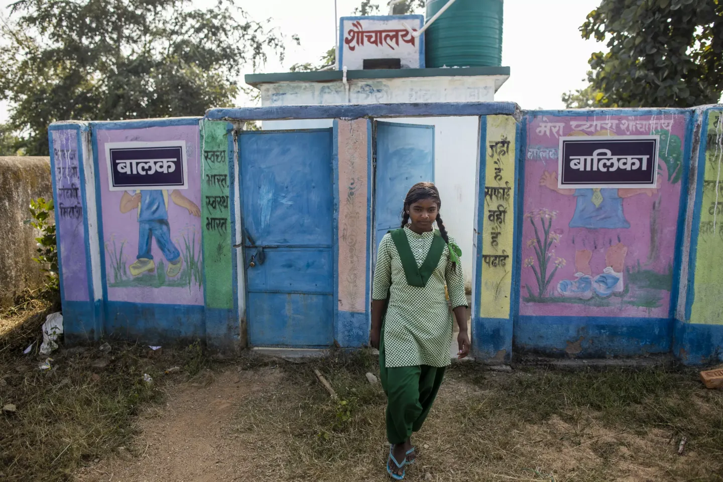 14 years old Kajal Kumari 9th Grade student using incinator machine which was installed inside the washroom for disposal of the&nbsp;sanitary&nbsp;pads.