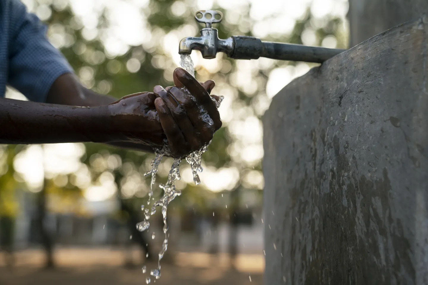 Child washing hands.