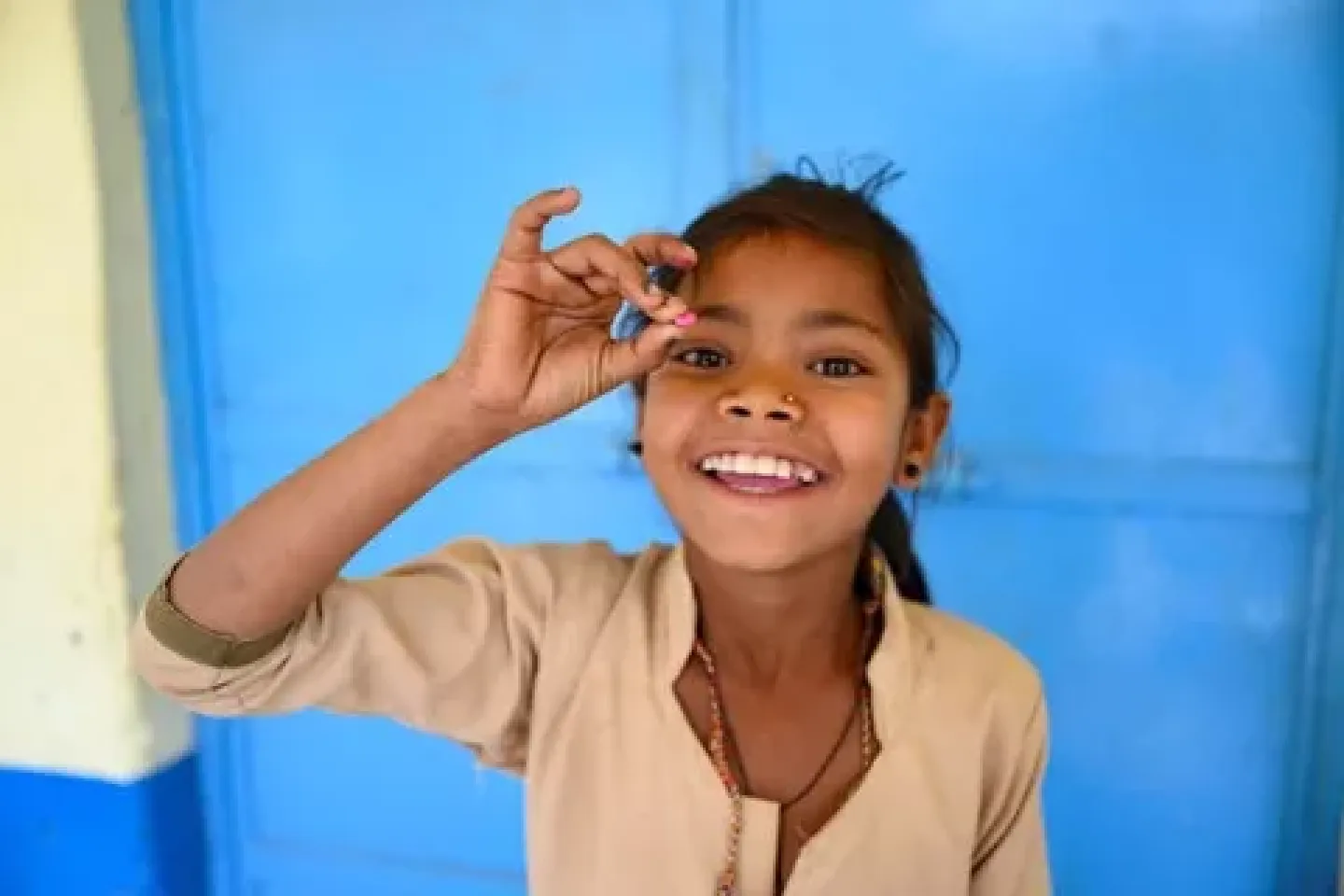 Rina (9) is given IFA tablet at her primary in Dungarpur, Rajasthan, India.