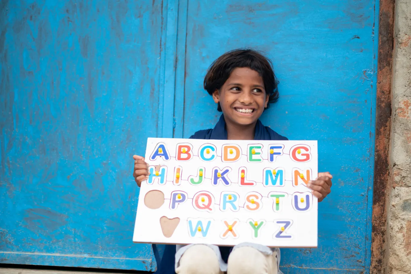 Priyanka (8) at home with the pre education activity kit given to her during lockdown. 