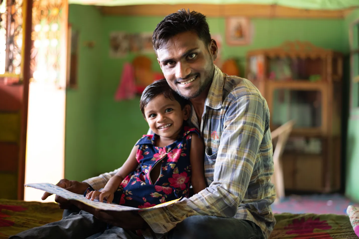 Dhuvi (3 years) gencouraged by her parents Kirit Kha and Savita to study while at home during covid times. 
