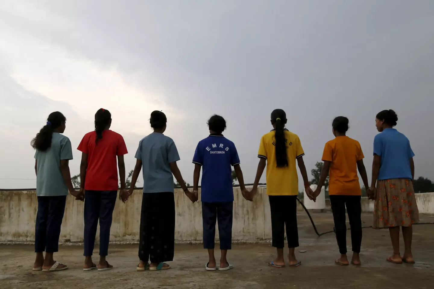 A group of young girls pictured &nbsp;together after participating in a psychosocial group session at the Eklavya Model Residential School for Girls (EMRS) in Dantewada, Chhattisgarh, India.