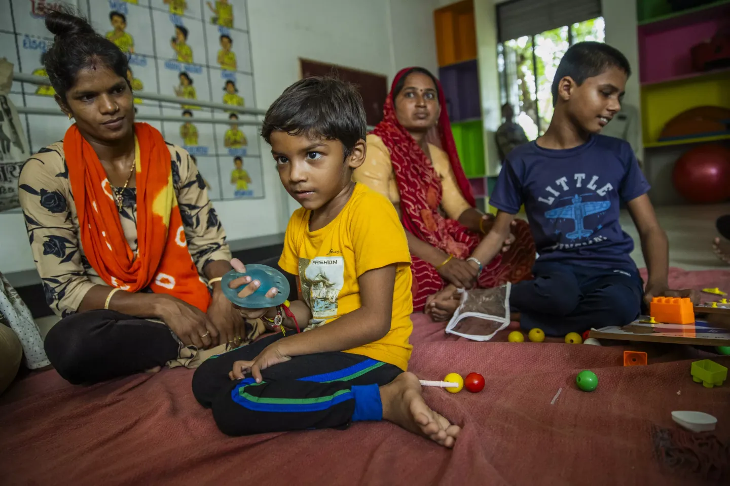 Viral Patel with his mother Shital Patel practicing fine motor skills under the Samagra Shiksha programme at Palundra Primary School.