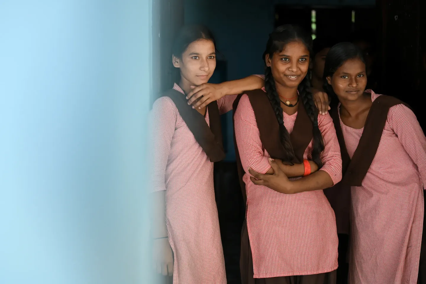 Ritu Nisad, Seema Nisad, and Anjali Kanojia (from left to right) are captured in a joyful and happy moment after participating in a handwashing hygiene session as part of the Dastak program.