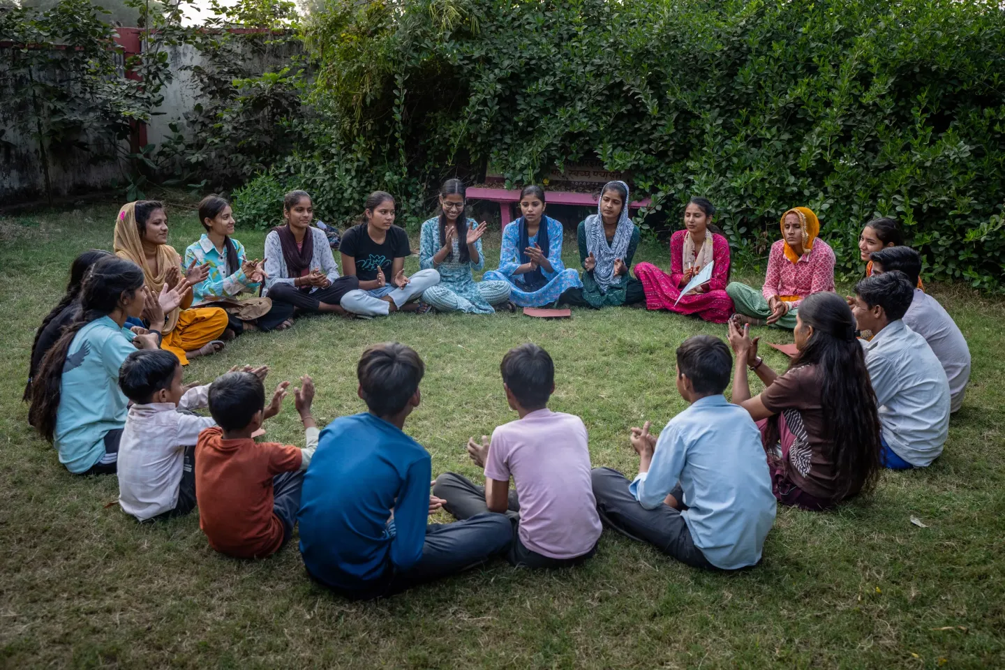 Members of the Adolescent  Girls Federation (AGF) and the Bal Panchayat, along with Saathin, are gathered for a meeting at the Gram Panchayat.